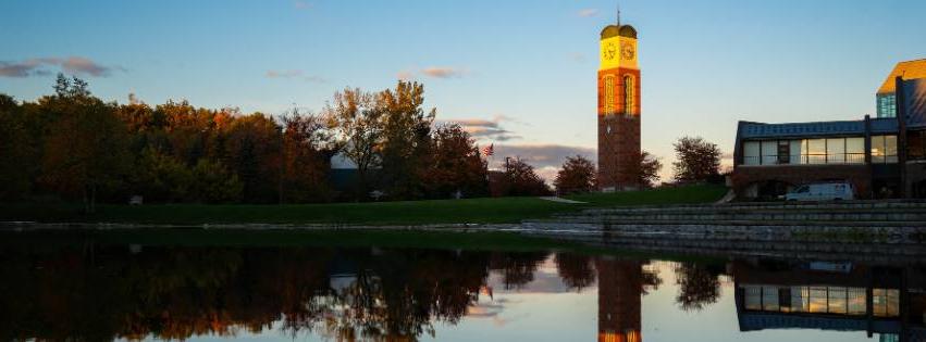 Image of the Cook Carillon Tower over Zumberg pond.